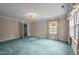 Bright bedroom with large window and adjoining closet at 12088 Burlington Rd, Hurdle Mills, NC 27541