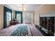 Elegant living room features a decorative fireplace, statement rug, and a bright front door at 12088 Burlington Rd, Hurdle Mills, NC 27541