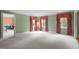 Bright living room with light green walls, carpeted floors, and natural light from multiple windows at 12088 Burlington Rd, Hurdle Mills, NC 27541
