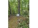 Trail marker sign with directions for the Creekside Trail and Inner Trail at 12088 Burlington Rd, Hurdle Mills, NC 27541