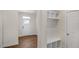 Bright entryway featuring hardwood floors, built-in storage and coat hooks at 121 Gilmer St, Fuquay Varina, NC 27526