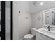 Clean bathroom with white cabinets, modern fixtures, and glass door shower at 12301 Hardee Rd, Raleigh, NC 27614