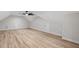 Bonus room featuring hardwood floors, modern ceiling fan, and neutral paint at 12301 Hardee Rd, Raleigh, NC 27614
