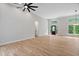 Spacious living area with high ceilings, hardwood floors, and a view of the front entrance at 12301 Hardee Rd, Raleigh, NC 27614