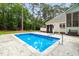 Beautiful pool with concrete patio and privacy fence at 12301 Hardee Rd, Raleigh, NC 27614