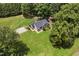 Spacious property featuring a well-manicured lawn and wooded surroundings at 133 Creekstone Dr, Benson, NC 27504