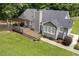 A cozy backyard features a large deck with a pergola, great for outdoor entertaining at 133 Creekstone Dr, Benson, NC 27504