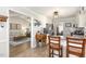 Kitchen with a breakfast bar seamlessly connecting to a living room, creating an inviting space at 133 Creekstone Dr, Benson, NC 27504