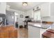 Bright kitchen with white cabinets and granite countertops at 133 Creekstone Dr, Benson, NC 27504