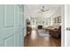 Comfortable living room features wood floors and a cozy fireplace at 133 Creekstone Dr, Benson, NC 27504