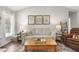 Bright living room with stylish decor and a comfortable seating area at 133 Creekstone Dr, Benson, NC 27504