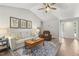 Cozy living room with vaulted ceilings, a ceiling fan and warm colors at 133 Creekstone Dr, Benson, NC 27504
