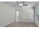 Bedroom featuring neutral walls, carpet, and ceiling fan at 136 Sycamore St, Cary, NC 27513