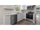 Updated kitchen with stainless steel appliances and marble countertops at 136 Sycamore St, Cary, NC 27513