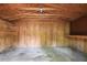 Inside the shed, featuring wood paneling and shelving at 136 Sycamore St, Cary, NC 27513