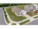 Aerial view of a corner-lot home with tidy landscaping and a fenced backyard at 1401 Justice Union Ct, Raleigh, NC 27604