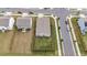 Aerial view of a home featuring a fenced backyard and landscaping in a suburban neighborhood at 1401 Justice Union Ct, Raleigh, NC 27604