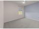 A carpeted bedroom features natural light from one window and neutral paint at 1401 Justice Union Ct, Raleigh, NC 27604