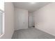 Bedroom showcasing carpeted floors, neutral paint, and a closet at 1401 Justice Union Ct, Raleigh, NC 27604