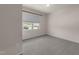 Bedroom with neutral carpet, a window with blinds, and pale yellow walls at 1401 Justice Union Ct, Raleigh, NC 27604