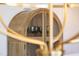 Arched wooden cabinet displaying elegant glassware at 1408 Sawyer Rd # 103, Raleigh, NC 27610