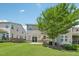 Large backyard features a well-maintained lawn, trees, and a patio area for outdoor enjoyment at 1534 Glenwater Dr, Cary, NC 27519
