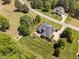 Aerial view of the property showcases a large lot, manicured lawn, and stylish home at 154 Sicily Dr, Clayton, NC 27527