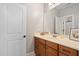 Bathroom with wood vanity, neutral walls and tile flooring at 154 Sicily Dr, Clayton, NC 27527