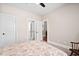 Neutral bedroom with adjoining bathroom and walk-in closet at 154 Sicily Dr, Clayton, NC 27527