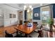 Dining room with an oriental rug, coffered ceiling, and plenty of natural light at 154 Sicily Dr, Clayton, NC 27527