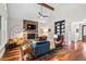 Cozy living room with a stone fireplace, vaulted ceilings, and stylish furnishings at 154 Sicily Dr, Clayton, NC 27527