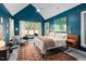 Stylish bedroom with a vaulted ceiling, lots of light, hardwood floors, and tasteful decor at 154 Sicily Dr, Clayton, NC 27527
