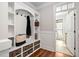 Organized mudroom with built-in storage, hooks, and baskets for efficient organization at 154 Sicily Dr, Clayton, NC 27527