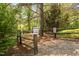 Entrance to the nature trail, perfect for outdoor activities and exploration at 154 Sicily Dr, Clayton, NC 27527