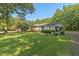 Charming home with a lush lawn and mature trees at 1593 E Washington Ave, Creedmoor, NC 27522