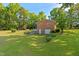 Brick home with mature landscaping at 1593 E Washington Ave, Creedmoor, NC 27522