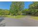 Charming home with a lush lawn and mature shade trees at 1593 E Washington Ave, Creedmoor, NC 27522