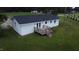 Beautifully maintained single-story home featuring a rear deck, ample yard space, and new roof at 1676 Richardson Bass Rd, Kenly, NC 27542