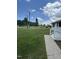 Well-manicured front yard with walkway and ample space at 1676 Richardson Bass Rd, Kenly, NC 27542