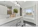 Spacious bathroom with double sink vanity, soaking tub, and large window at 169 Horseshoe Pl # 55, Angier, NC 27501