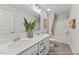 Bathroom with double sink vanity, modern lighting, and shower/tub at 169 Horseshoe Pl # 55, Angier, NC 27501