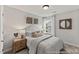 Well-lit bedroom featuring neutral color scheme, carpet flooring, and modern furnishings at 169 Horseshoe Pl # 55, Angier, NC 27501