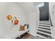 Mud room area with bench seating, hooks, and stairs to the second floor at 169 Horseshoe Pl # 55, Angier, NC 27501