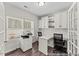 Functional home office featuring ample workspace, built in cabinetry, and natural lighting at 169 Horseshoe Pl # 55, Angier, NC 27501