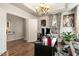 Home office with hardwood flooring and large windows allowing natural light at 1716 Longmont Dr, Wake Forest, NC 27587