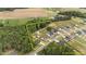 An aerial view showing the approximate property lines of a home and surrounding acreage with lush greenery at 176 Lowery Ln, Benson, NC 27504