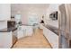 Bright kitchen with granite countertops, stainless steel appliances, and a spacious layout at 176 Lowery Ln, Benson, NC 27504