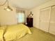 Bedroom featuring a vintage bed and plenty of closet space at 1818 Brookrun Rd, Henderson, NC 27536