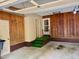 View of the garage with an elevated area at 1818 Brookrun Rd, Henderson, NC 27536