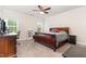 Spacious bedroom with a ceiling fan, desk and good natural light at 1828 Wellspring Ct, Graham, NC 27253